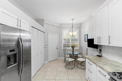 This charming first-floor condo offers comfortable living with on Polo Club of Boca Raton in Florida - for sale on GolfHomes.com, golf home, golf lot