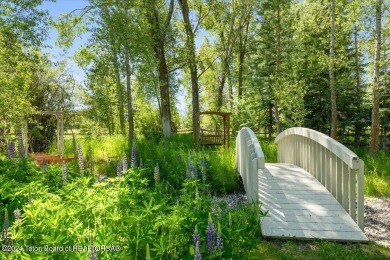 Immerse yourself in a private Jackson Hole estate, surrounded by on Jackson Hole Golf and Tennis Club in Wyoming - for sale on GolfHomes.com, golf home, golf lot