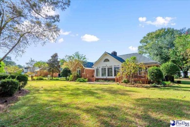 Discover your dream home nestled on over half an acre in the on Country Club of South Carolina in South Carolina - for sale on GolfHomes.com, golf home, golf lot