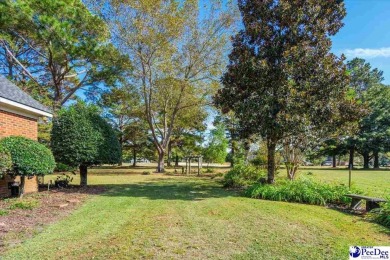 Discover your dream home nestled on over half an acre in the on Country Club of South Carolina in South Carolina - for sale on GolfHomes.com, golf home, golf lot