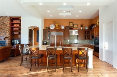 Nestled within the prestigious guard-gated Anthem Country Club on Rio Secco Golf Club in Nevada - for sale on GolfHomes.com, golf home, golf lot