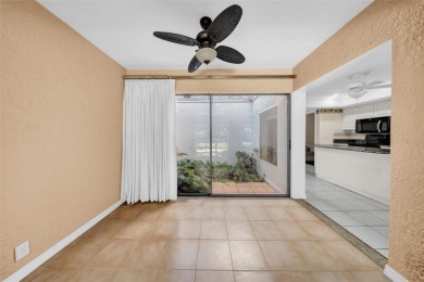 Welcome to this spacious 2-story condo townhouse in the highly on Carrollwood Country Club in Florida - for sale on GolfHomes.com, golf home, golf lot