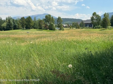 This .44 acre custom golf home site in beautiful Teton Springs on Teton Springs Resort and Club in Idaho - for sale on GolfHomes.com, golf home, golf lot