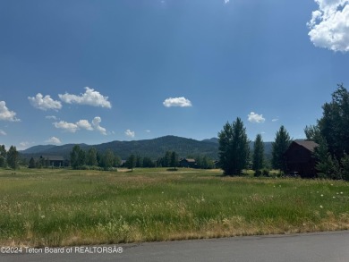 This .44 acre custom golf home site in beautiful Teton Springs on Teton Springs Resort and Club in Idaho - for sale on GolfHomes.com, golf home, golf lot