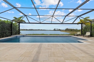 Experience the ultimate backyard paradise in this 4-bedroom on Lakewood National Golf Club in Florida - for sale on GolfHomes.com, golf home, golf lot