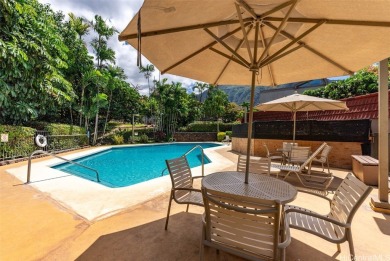 Step into serenity with this inviting 2-bedroom, 1-bathroom on Makaha Valley Country Club in Hawaii - for sale on GolfHomes.com, golf home, golf lot