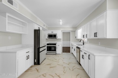 Your Dream Home Awaits! This beautifully remodeled 4-bedroom, 2 on Mississippi National Golf Course in Mississippi - for sale on GolfHomes.com, golf home, golf lot