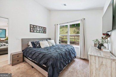 Ready to call this recently built home in Lake Arrowhead on The Highlands Course at Lake Arrowhead in Georgia - for sale on GolfHomes.com, golf home, golf lot