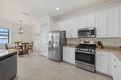 Experience the ultimate backyard paradise in this 4-bedroom on Lakewood National Golf Club in Florida - for sale on GolfHomes.com, golf home, golf lot