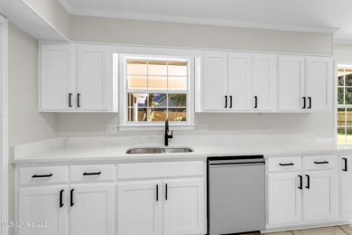 Your Dream Home Awaits! This beautifully remodeled 4-bedroom, 2 on Mississippi National Golf Course in Mississippi - for sale on GolfHomes.com, golf home, golf lot