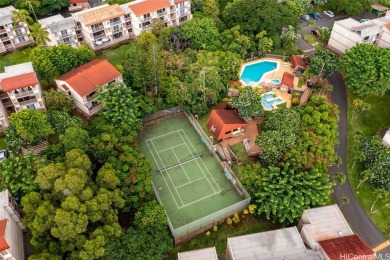 Step into serenity with this inviting 2-bedroom, 1-bathroom on Makaha Valley Country Club in Hawaii - for sale on GolfHomes.com, golf home, golf lot