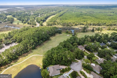 Discover the perfect blend of tranquility and convenience with on The Club At Osprey Cove in Georgia - for sale on GolfHomes.com, golf home, golf lot