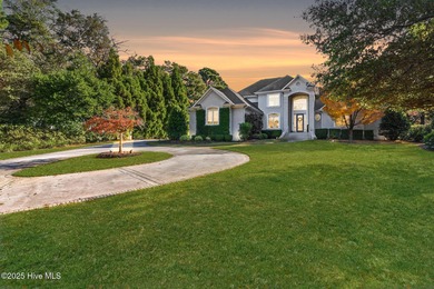 Priced aggressively for a quick sale, this elegant custom home on Porters Neck Country Club in North Carolina - for sale on GolfHomes.com, golf home, golf lot