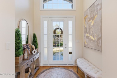 Priced aggressively for a quick sale, this elegant custom home on Porters Neck Country Club in North Carolina - for sale on GolfHomes.com, golf home, golf lot