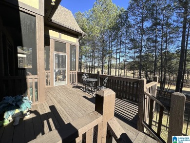 This home's location overlooking the first hole of the on Ballantrae Golf Club in Alabama - for sale on GolfHomes.com, golf home, golf lot