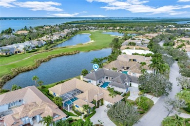 This stunning courtyard pool home with serene lake views has on Orchid Island Golf and Beach Club in Florida - for sale on GolfHomes.com, golf home, golf lot