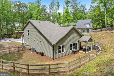 Ready to call this recently built home in Lake Arrowhead on The Highlands Course at Lake Arrowhead in Georgia - for sale on GolfHomes.com, golf home, golf lot