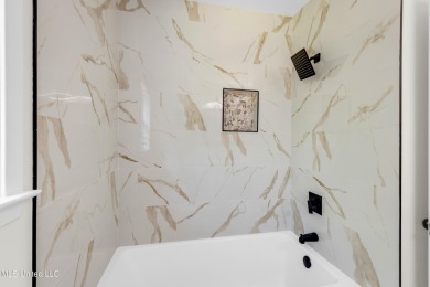 Your Dream Home Awaits! This beautifully remodeled 4-bedroom, 2 on Mississippi National Golf Course in Mississippi - for sale on GolfHomes.com, golf home, golf lot