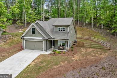Ready to call this recently built home in Lake Arrowhead on The Highlands Course at Lake Arrowhead in Georgia - for sale on GolfHomes.com, golf home, golf lot