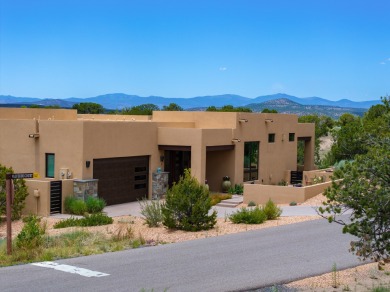 Discover the perfect blend of modern luxury and Southwest charm on The Club At Las Campanas  in New Mexico - for sale on GolfHomes.com, golf home, golf lot