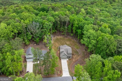 Ready to call this recently built home in Lake Arrowhead on The Highlands Course at Lake Arrowhead in Georgia - for sale on GolfHomes.com, golf home, golf lot