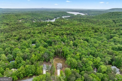 Ready to call this recently built home in Lake Arrowhead on The Highlands Course at Lake Arrowhead in Georgia - for sale on GolfHomes.com, golf home, golf lot