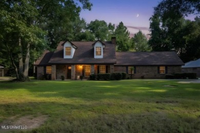 Your Dream Home Awaits! This beautifully remodeled 4-bedroom, 2 on Mississippi National Golf Course in Mississippi - for sale on GolfHomes.com, golf home, golf lot