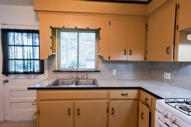 Charming 3BR/1BA home just one block from the Park Hill Historic on  in Arkansas - for sale on GolfHomes.com, golf home, golf lot