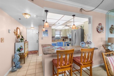 Welcome to elevated living ~ literally. This 2-bedroom on Grande Oaks Golf Club in Florida - for sale on GolfHomes.com, golf home, golf lot