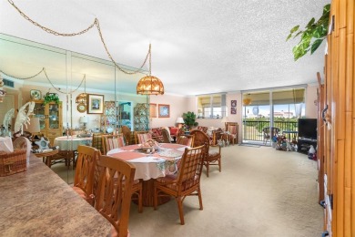 Welcome to elevated living ~ literally. This 2-bedroom on Grande Oaks Golf Club in Florida - for sale on GolfHomes.com, golf home, golf lot