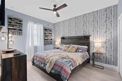 Welcome to the Fire  Ice Castle, a beautifully remodeled on The Oasis Club at Champions Gate in Florida - for sale on GolfHomes.com, golf home, golf lot
