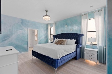 Welcome to the Fire  Ice Castle, a beautifully remodeled on The Oasis Club at Champions Gate in Florida - for sale on GolfHomes.com, golf home, golf lot