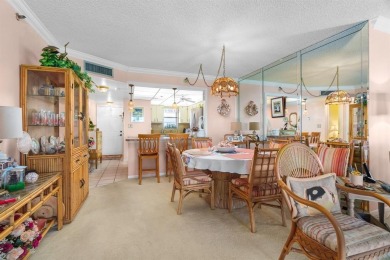 Welcome to elevated living ~ literally. This 2-bedroom on Grande Oaks Golf Club in Florida - for sale on GolfHomes.com, golf home, golf lot