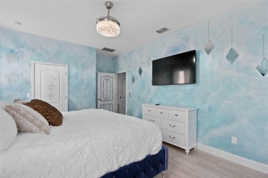 Welcome to the Fire  Ice Castle, a beautifully remodeled on The Oasis Club at Champions Gate in Florida - for sale on GolfHomes.com, golf home, golf lot