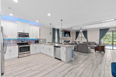 Welcome to the Fire  Ice Castle, a beautifully remodeled on The Oasis Club at Champions Gate in Florida - for sale on GolfHomes.com, golf home, golf lot