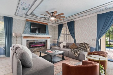 Welcome to the Fire  Ice Castle, a beautifully remodeled on The Oasis Club at Champions Gate in Florida - for sale on GolfHomes.com, golf home, golf lot