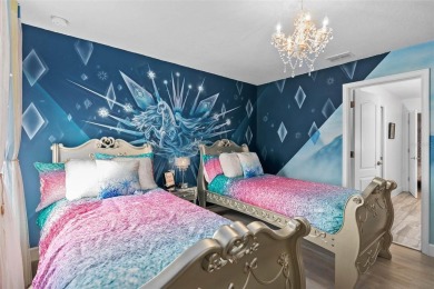 Welcome to the Fire  Ice Castle, a beautifully remodeled on The Oasis Club at Champions Gate in Florida - for sale on GolfHomes.com, golf home, golf lot