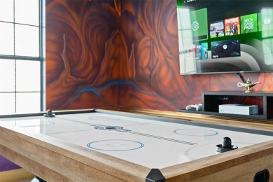 Welcome to the Fire  Ice Castle, a beautifully remodeled on The Oasis Club at Champions Gate in Florida - for sale on GolfHomes.com, golf home, golf lot