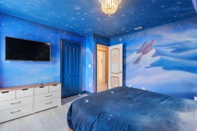 Welcome to the Fire  Ice Castle, a beautifully remodeled on The Oasis Club at Champions Gate in Florida - for sale on GolfHomes.com, golf home, golf lot