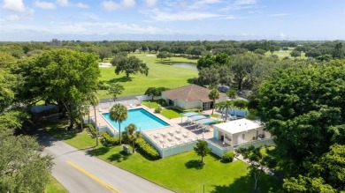 Welcome to elevated living ~ literally. This 2-bedroom on Grande Oaks Golf Club in Florida - for sale on GolfHomes.com, golf home, golf lot