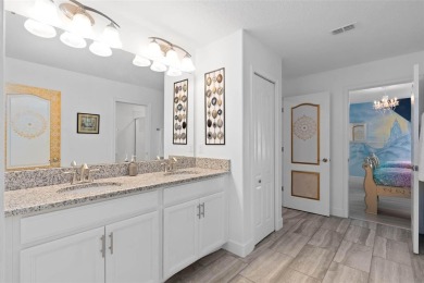 Welcome to the Fire  Ice Castle, a beautifully remodeled on The Oasis Club at Champions Gate in Florida - for sale on GolfHomes.com, golf home, golf lot
