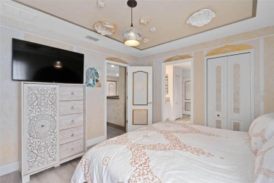 Welcome to the Fire  Ice Castle, a beautifully remodeled on The Oasis Club at Champions Gate in Florida - for sale on GolfHomes.com, golf home, golf lot