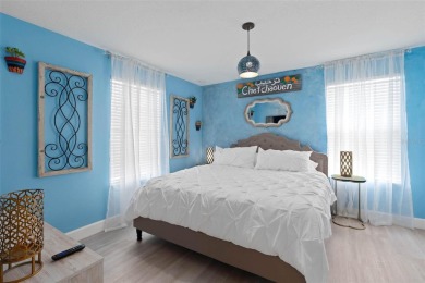 Welcome to the Fire  Ice Castle, a beautifully remodeled on The Oasis Club at Champions Gate in Florida - for sale on GolfHomes.com, golf home, golf lot