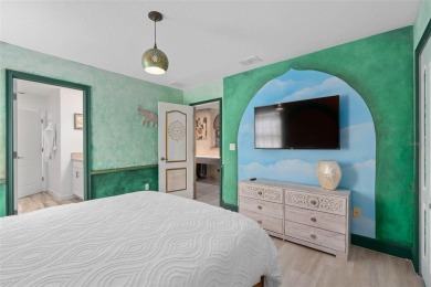 Welcome to the Fire  Ice Castle, a beautifully remodeled on The Oasis Club at Champions Gate in Florida - for sale on GolfHomes.com, golf home, golf lot