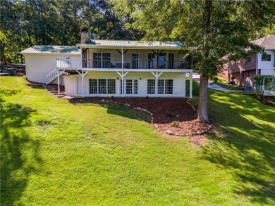 Stunning lake views in a gated community. This beautiful 3 on Fairfield Plantation Golf and Country Club in Georgia - for sale on GolfHomes.com, golf home, golf lot