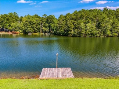 Stunning lake views in a gated community. This beautiful 3 on Fairfield Plantation Golf and Country Club in Georgia - for sale on GolfHomes.com, golf home, golf lot