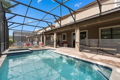 Welcome to the Fire  Ice Castle, a beautifully remodeled on The Oasis Club at Champions Gate in Florida - for sale on GolfHomes.com, golf home, golf lot