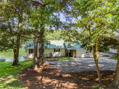 Stunning lake views in a gated community. This beautiful 3 on Fairfield Plantation Golf and Country Club in Georgia - for sale on GolfHomes.com, golf home, golf lot