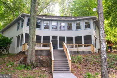 Dive into lakeside luxury at its finest in the heart of Turtle on Turtle Cove Golf Course in Georgia - for sale on GolfHomes.com, golf home, golf lot