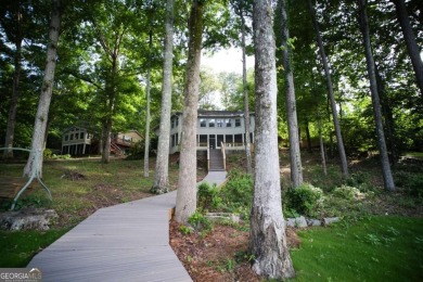 Dive into lakeside luxury at its finest in the heart of Turtle on Turtle Cove Golf Course in Georgia - for sale on GolfHomes.com, golf home, golf lot